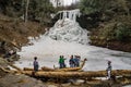 Children Enjoying Frozen Cascade Falls Royalty Free Stock Photo